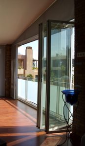 Cortina de cristal replegable para salon almeria distecalum